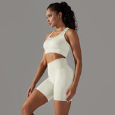 Nahtloser gestrickter hoher Taillen-Bauch-Kontraktur-Übungs-Yoga-Trainings-BH-Weste-Shorts-Strumpfhosen-Anzug
